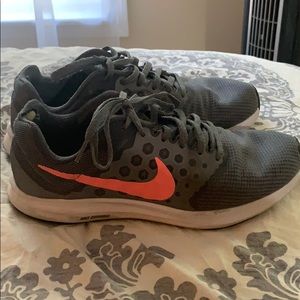 Nike pink and gray running shoes